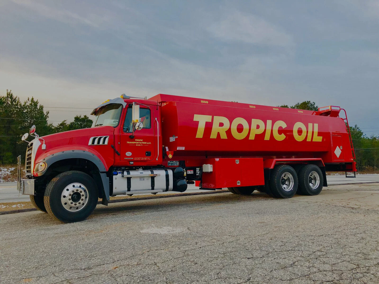 Tropic Oil red tanker truck carrying premium fuel in Florida.